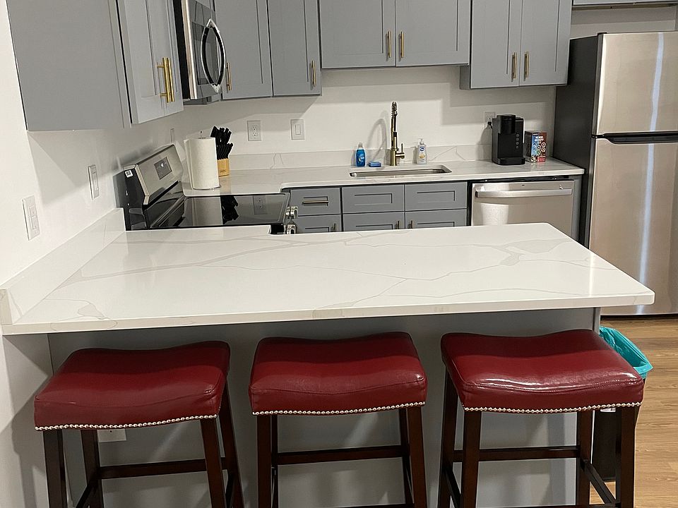 Updated kitchen with quartz countertops.