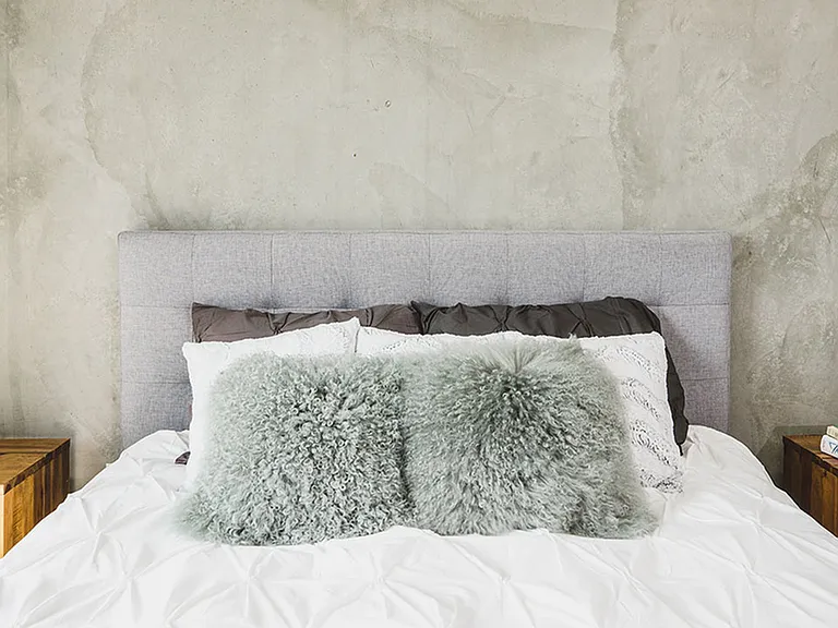 Brightly lit bedroom fit for a queen