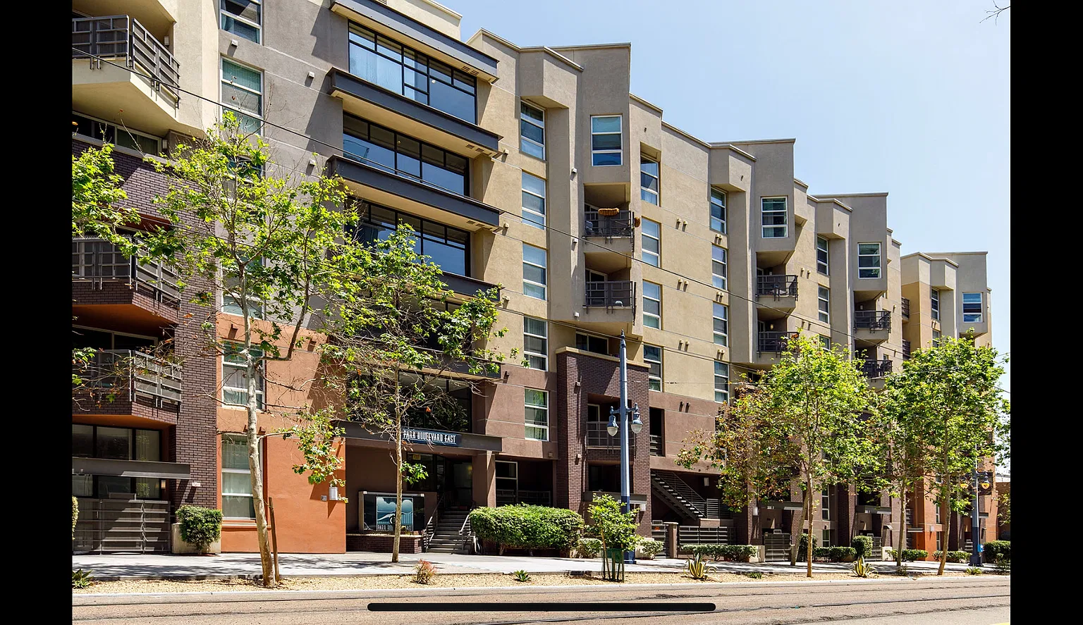 Fully Furnished Top-Floor 2-Story Urban Retreat with Private Rooftop Deck & Bay Views — Photo 1
