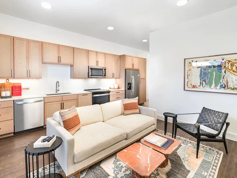 Elevate your culinary experience with sleek quartz countertops, soft-close cabinets, and ambient under-cabinet lighting.