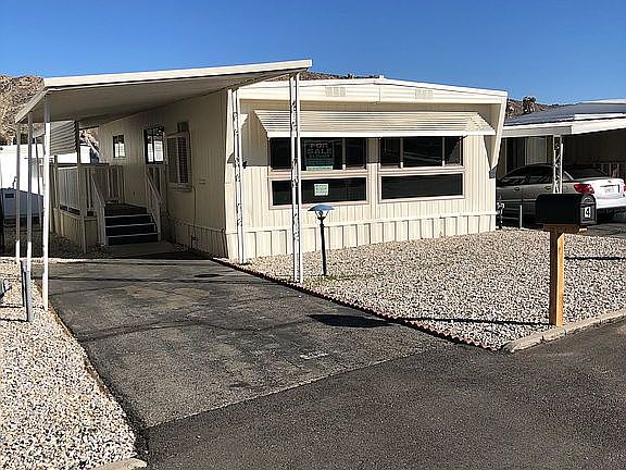 Paved and covered carport