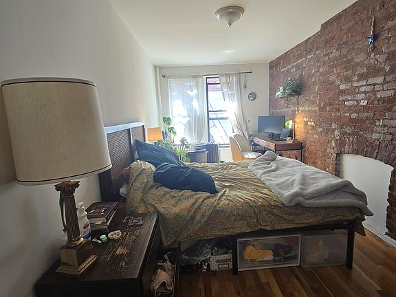 2nd image of 319 E 9th St APT 7