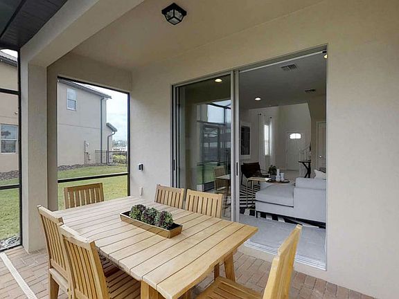 Watch Your Friends and Family in Your New Home Pool and You Relax in the Lanai Shade