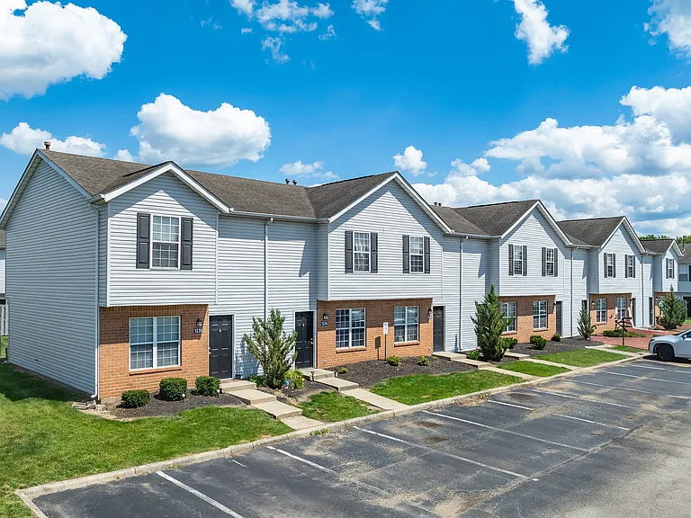 Entry-way and patio view of apartments at River Valley in Lancaster, OH.