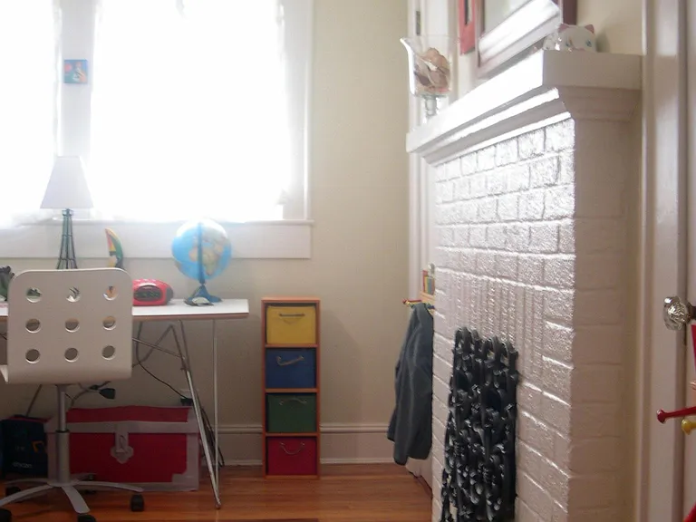 Bedroom with working gas log fireplace