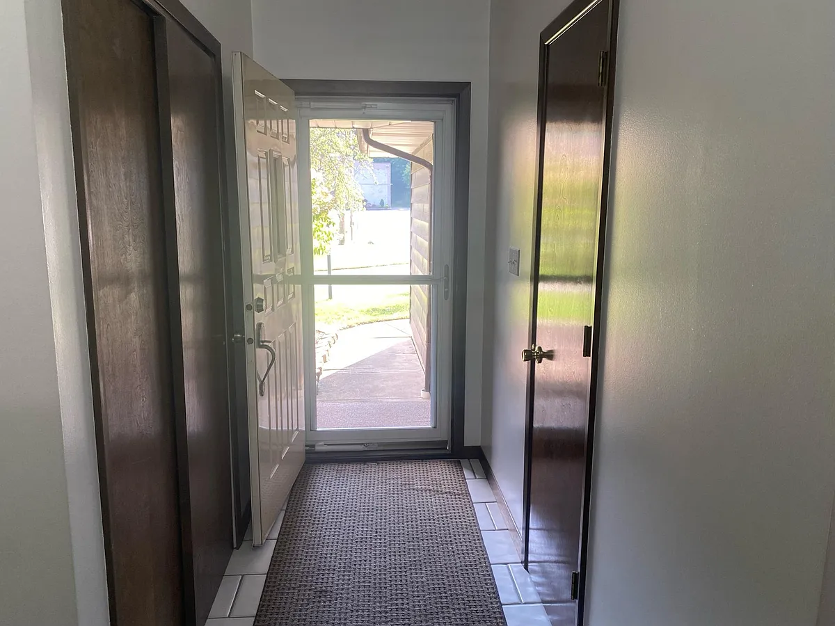 hallway to the front door - 6583 Harris Rd
