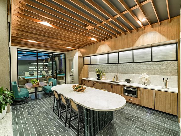 Host with ease in the stylish entertainment kitchen at Modera St. Paul, designed for gatherings just minutes from downtown Dallas attractions.