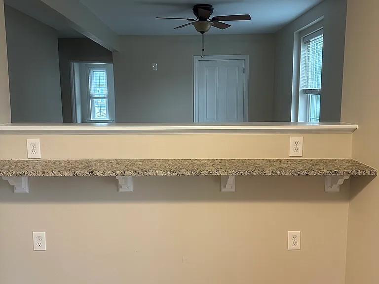 Kitchen view looking into living room