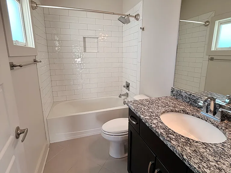 This is the full bath for the fourth bedroom and the deck area