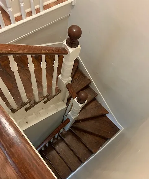 spiral staircase as you enter apartment