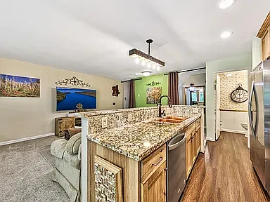 The family room was repainted to a neutral color after this photo was taken