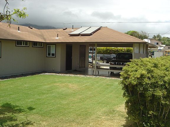 Back of carport and side view
