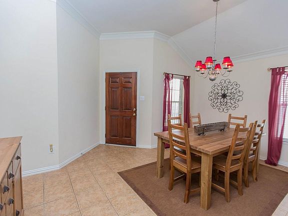 Looking back at the front entryway and dining room.