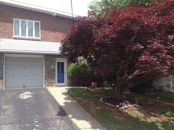 Single car garage and driveway.