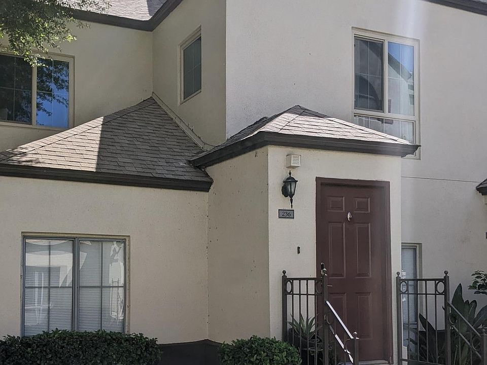 Entrance with stoop; second floor unit