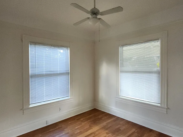 Front bedroom looking at corner windows