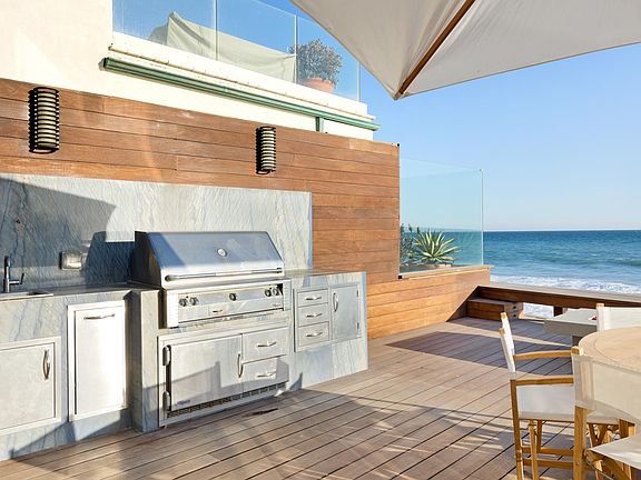 Relax on the deck with a built-in BBQ and a lovely view.