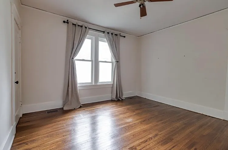 Back Bedroom with closet and connected to laundry room