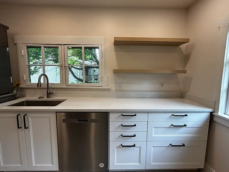All new kitchen - cabinets, quartz counters, stainless appliances, plumbing fixtures