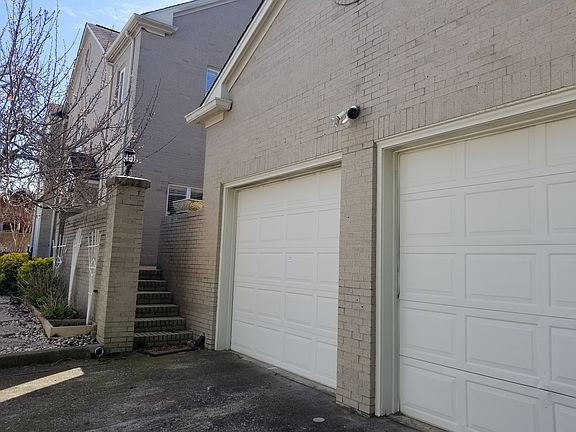 Garage and steps to private patio