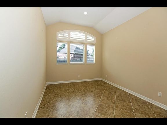 The breakfast nook is an alcove, off the kitchen.