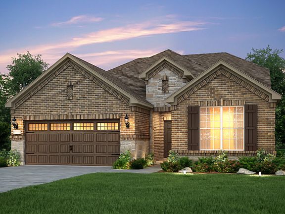 The Mooreville, a two-story home with 2-car garage, shown with Home Exterior B