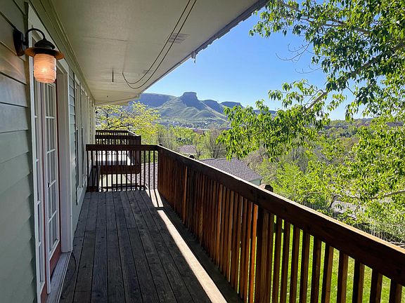 Back deck offers stunning views of south table mountain. Deck is 22 feet long.