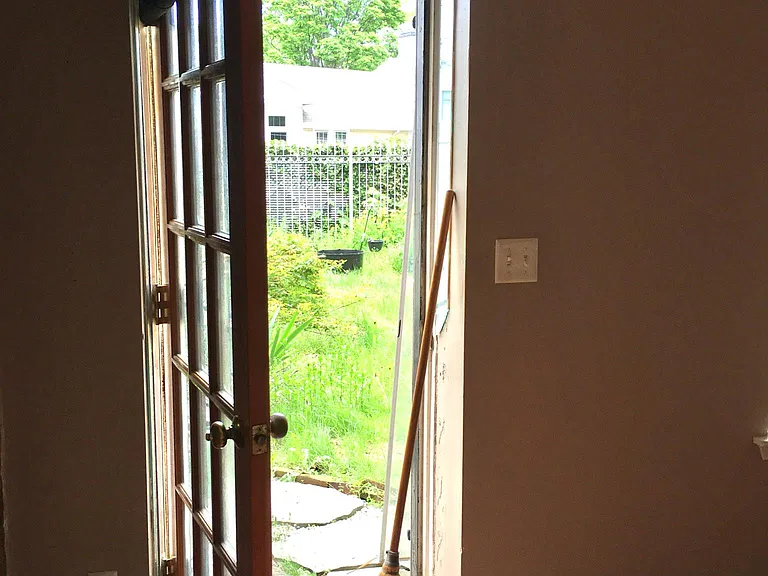 door to yard from living room