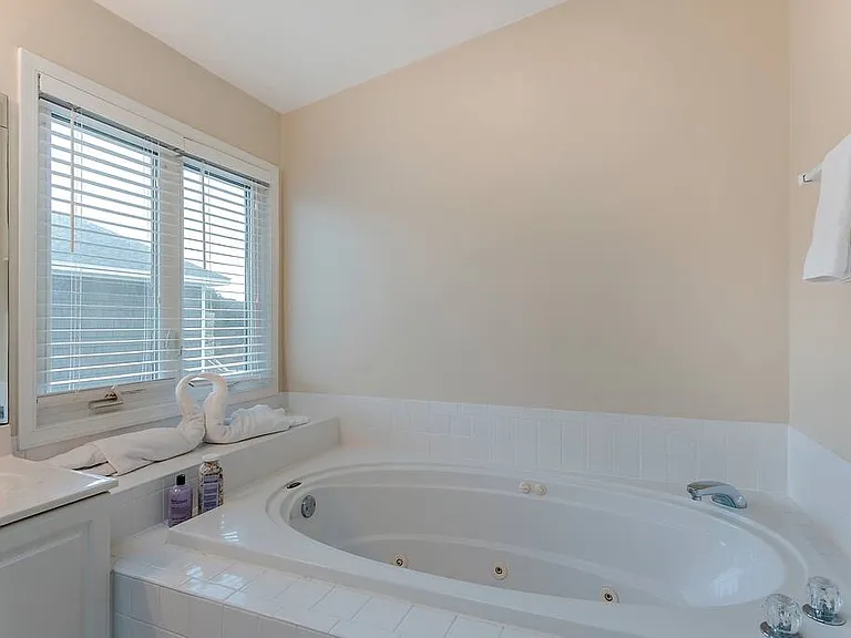 Soak in the jacuzzi tub to relax from the day