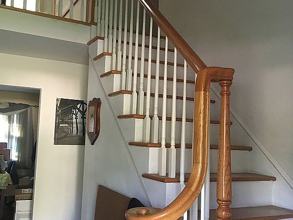 Oak stairs open foyer 