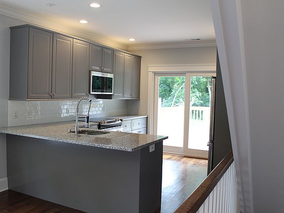 Kitchen w/ sliders onto deck