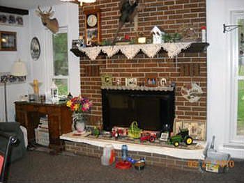 Check out the cozy family room with fireplace to cuddle by on those cool nights.br