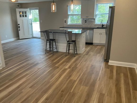 kitchen- open concept. granite countertops ss appliances