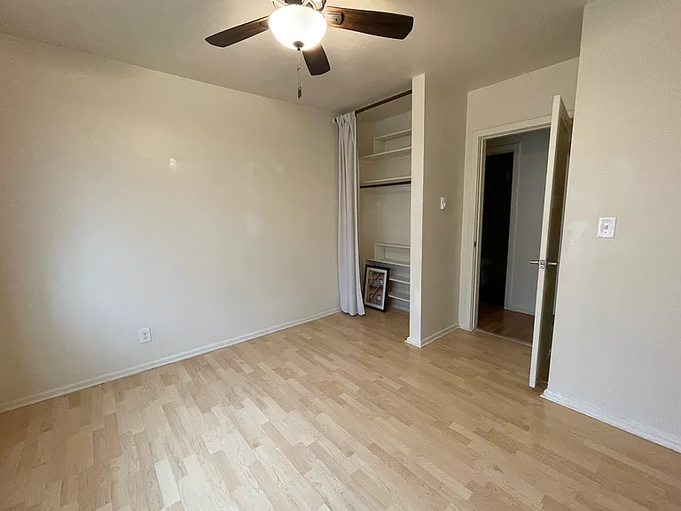Bedroom with view of closet.