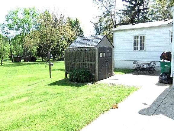 Rear Patio, Shed and Exterior of Family Rm addition.