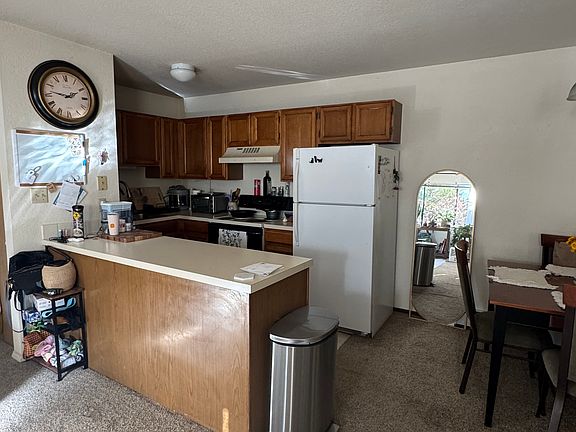 kitchen with dining area to the right.