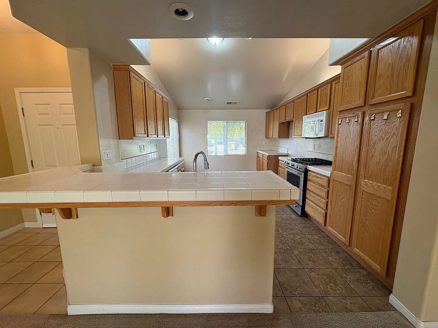 3 Bedroom Home with 2-Car Garage, Bonus Room, Covered Patio & Gardening Included — Photo 2