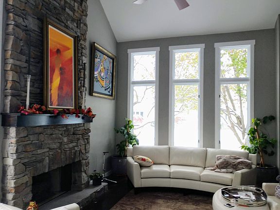 Great Room, 17 foot high fireplace, vaulted ceiling, exposed beam and floor to ceiling windows!