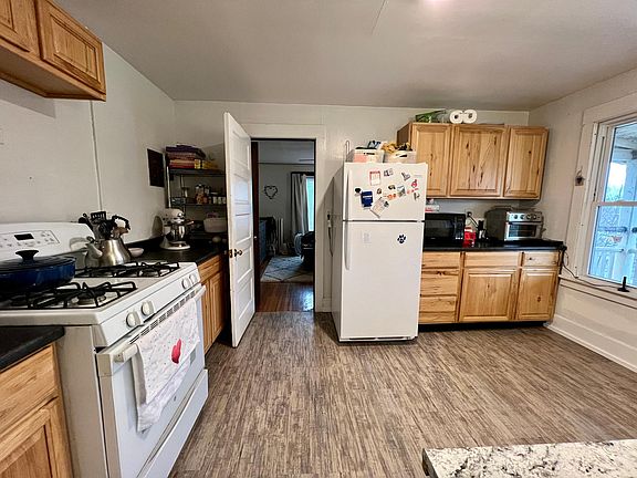 Kitchen (with view to large bedroom)