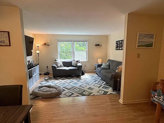 Looking from the dining room into the living room area. The are is an open floorplan.