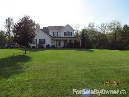 Spacious yard-no neighbors behind you
						:
						Plenty of room for kids to play or dogs to run...the back is just as large
