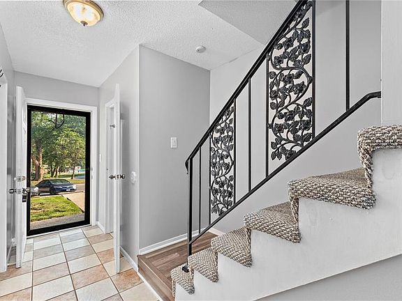 4th image of 6948 NW Chapel Woods Ln