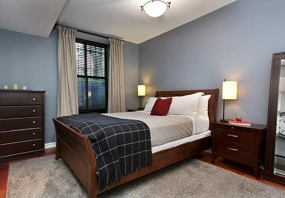 Main bedroom has hardwood floors and large built-in closet.