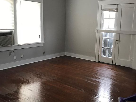 Living space with a partial view of back patio