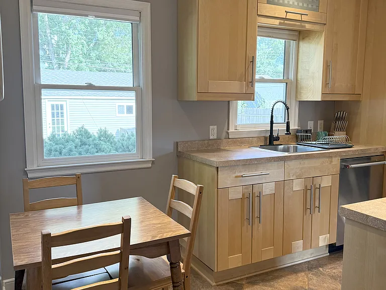 Kitchen table that can seat up to 4, extra chair available if you need it.