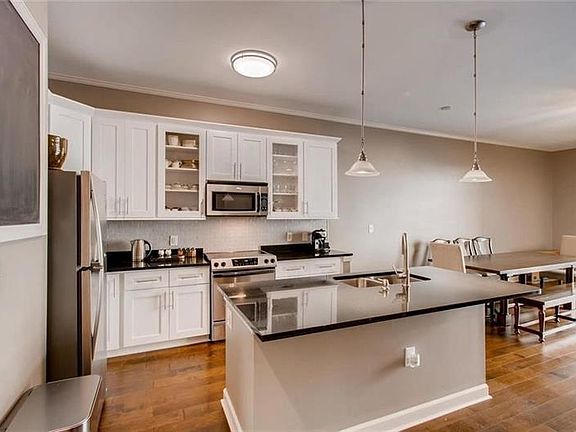2nd image of 711 Cosmopolitan Dr NE #234