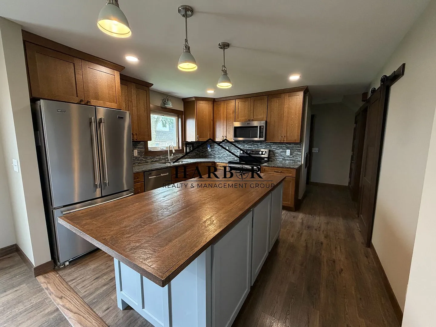 *1/2 Off First Months Rent* Spacious 3BR Home with 2-Stall Garage & Private Deck in Kasson — Photo 1