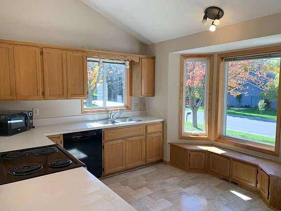 Spacious kitchen with ample cabinetry. All appliances provided - Range, Refrigerator, Microwave, Dishwasher.