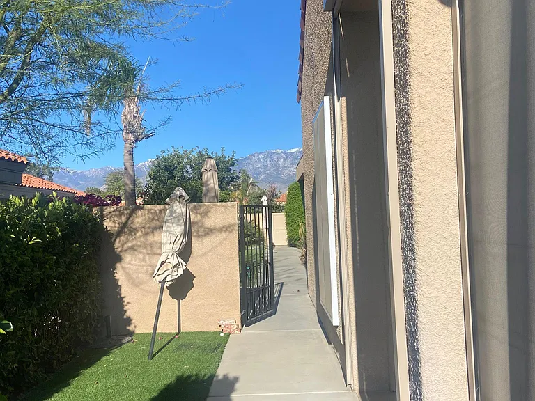 Well maintained, pretty green turf for low maintenance desert living. Landscaping maintenance is provided.
