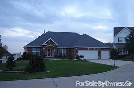 Front view w 3 car Garage
						:
						Landscaped w/yard sprinkling system